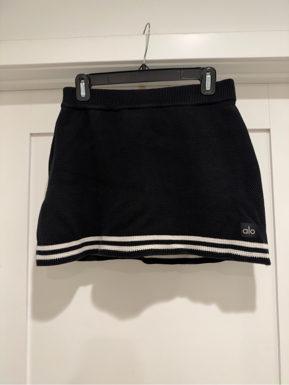 ALO Yoga Black Mini Skirt with White Stripe Detail